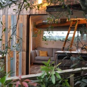 tree house with a big window, unique accommodation display